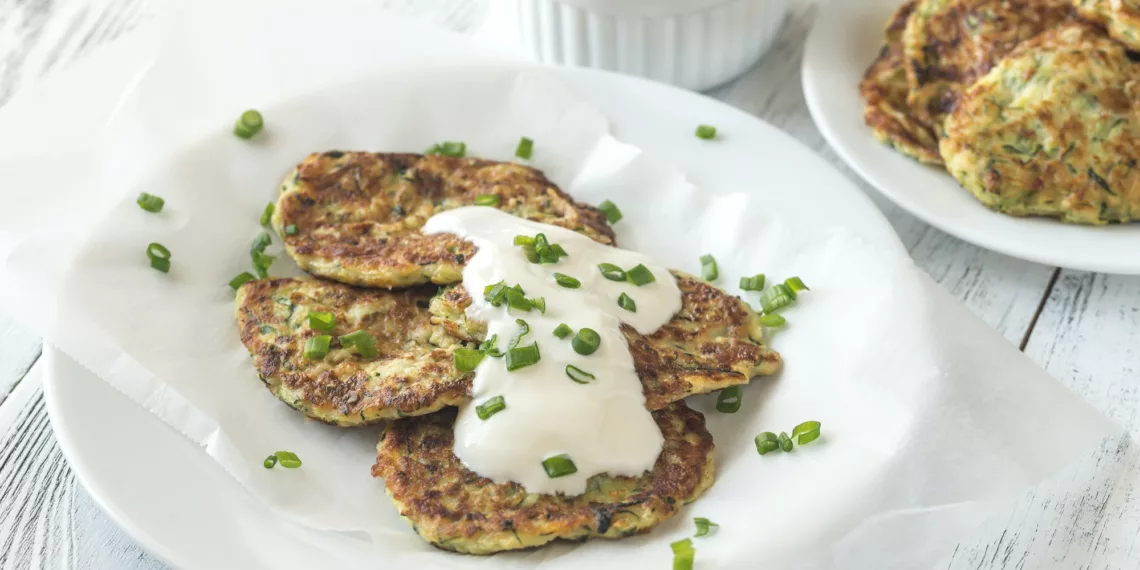 Zucchini Fritters With Tzatziki Sauce - Thefoodiebunch Zucchini Fritters