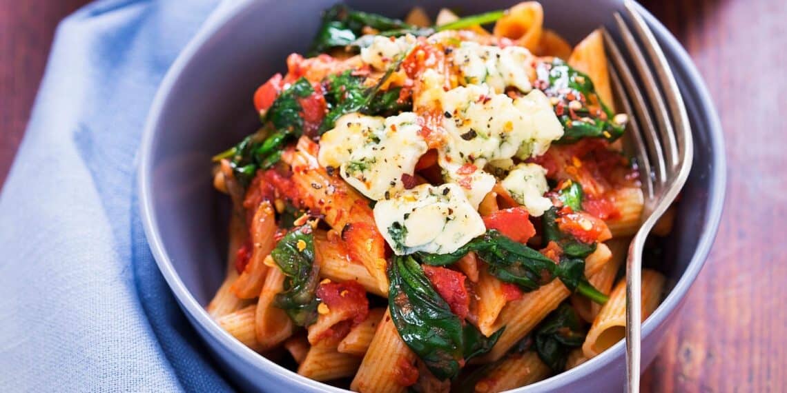Quick And Easy Chicken Pasta With Spinach And Tomatoes In A Parmesan Cream Sauce