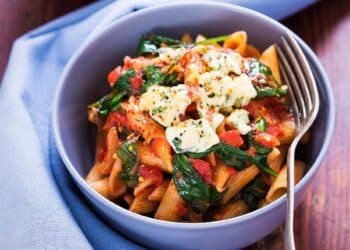 Quick And Easy Chicken Pasta With Spinach And Tomatoes In A Parmesan Cream Sauce