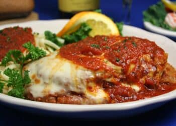 Healthy Chicken Parmesan With Hot Peppers Served With Spaghetti