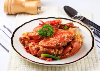 Authentic Singaporean Chilli Crab On A White Plate