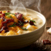 Filling Baked Potato Soup - Thefoodiebunch Creamy Baked Potato Soup Topped With Melted Cheddar, Crispy Bacon Crumbles, And Fresh Chives In A Stoneware Bowl