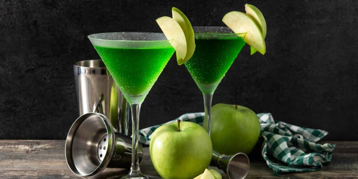 Easy Appletini (Sour Apple Martini) With Slices Of Apples Garnish
