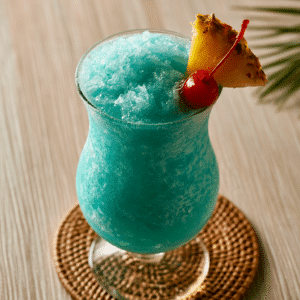 Tropical Blue Hawaiian Cocktail: A Taste Of Paradise - Thefoodiebunch Blue Hawaiian Cocktail Creamy Frozen Tropical Rum Drink